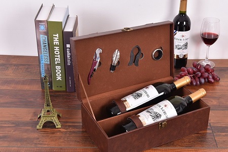 What are the specific benefits of leather wine boxes for red wine?
